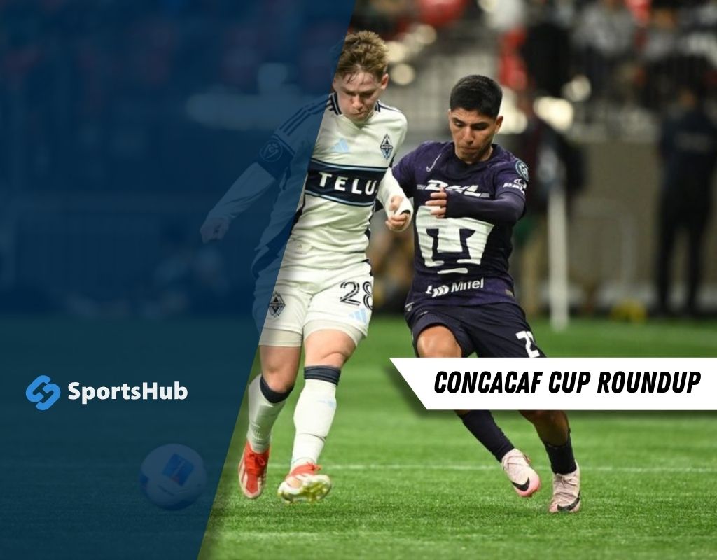 Two soccer players compete for the ball during a CONCACAF Cup match, with one in a white uniform and the other in dark purple.