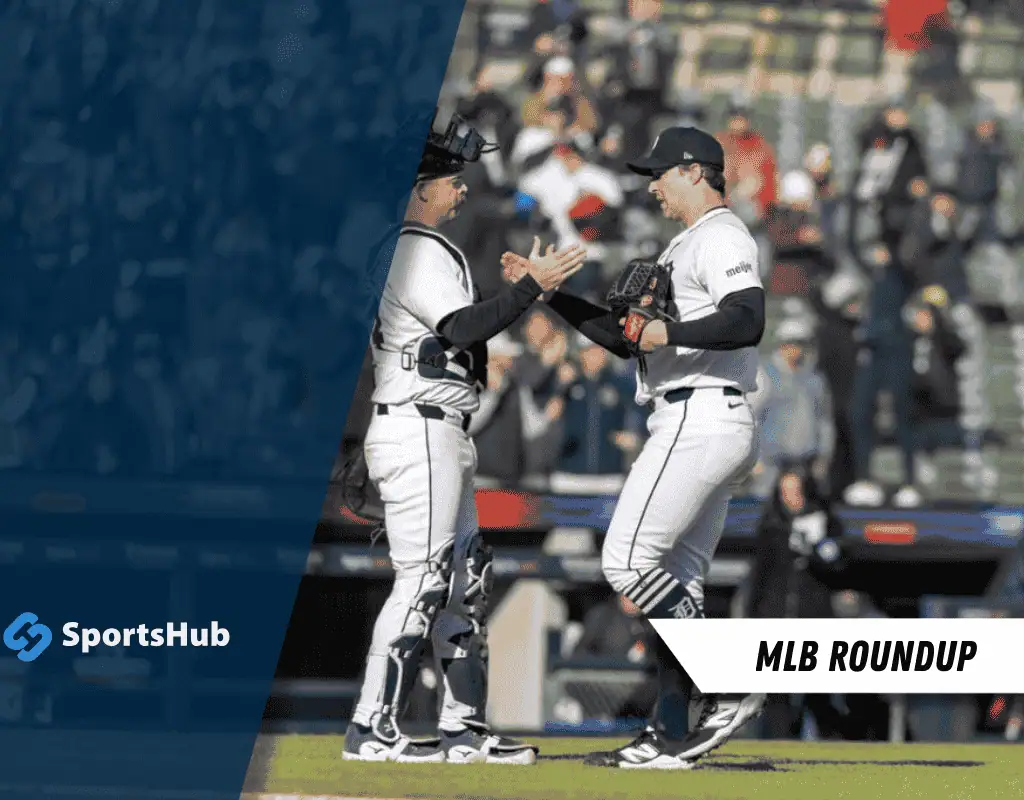 A baseball pitcher celebrates with a catcher on the field, showcasing team spirit amidst a cheering crowd. MLB Roundup graphic included.