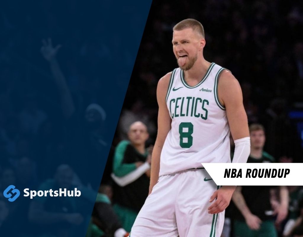 A basketball player in a Celtics jersey stands on the court, reflecting on a recent game, amidst a cheering crowd.