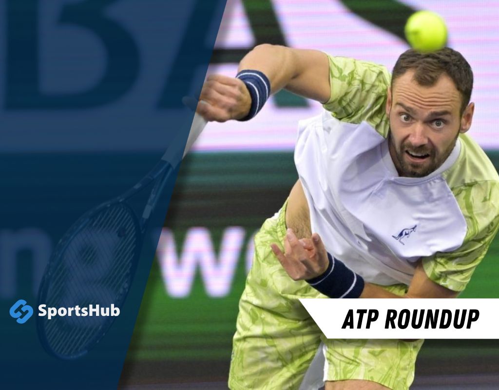A tennis player in a green outfit serves on the court, with a racket in hand and a bright yellow ball in the air.