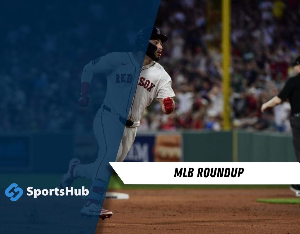 Boston Red Sox player running bases during MLB game.